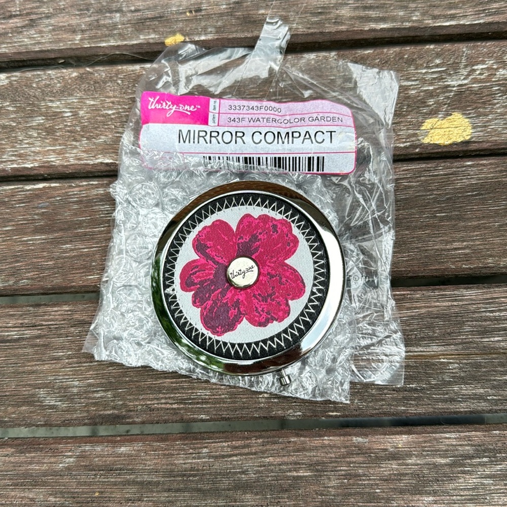 Thirty-one compact mirror watercolor garden